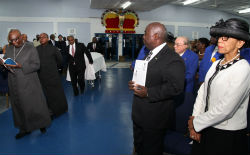 Deputy_Prime_Minister_and_Attorney_General_Pay_Their_Respects_to_the_Late_Count_Bernadino_sm.jpg