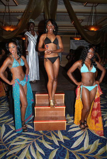 thebahamasweekly Miss Grand Bahama holds Evening Gown and